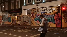 After the Notting Hill Carnival late at night homes and shops remain bordered up. The homes and shops had this protection to protect vandalism from those attending the Notting Hill Carnival
