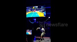 People Play AI Table Tennis Game at the Sega Metropolis Park in Shanghai, China