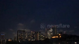 Timelapse of rare blue supermoon rising above Tokyo