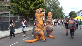 T-Rexes entertain crowds at Notting Hill Carnival 2023 in London