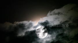 Stunning blue supermoon emerges from behind clouds above Indonesia