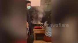 Korean barbecue catches fire in front of restaurant customers