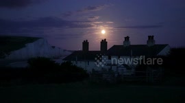 Rare 'Super Blue Moon' in UK skies above Seven Sisters Cliffs