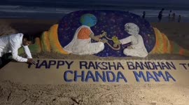 Sand Artist makes Beautiful Sculpture On Puri Beach Dedicated to 'Chanda Mama'