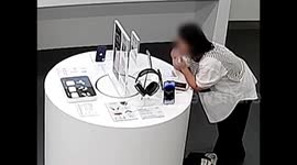 Chinese woman bites through security wire to nab £700 iPhone in store