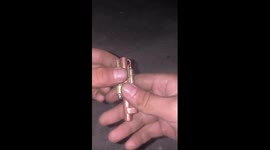 Ukrainian soldier made a lighter from spare parts and a machine gun cartridge