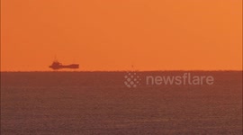 Fata Morgana mirage seen at sunrise off Kent, UK coast