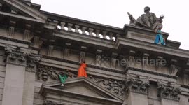 Dancers on the south side of St Paul's Cathedral preform Resurgam by Bandaloop part of the Greenwich And Docklands International Festival