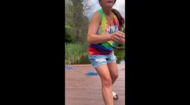 Woman Catches Catfish After It Takes Off With Her Fishing Pole