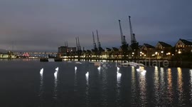 Robotic Swans swim around the Royal Albert Dock as part of the Greenwich and Docklands International Festival. The performance of the swans was called CYGNUS created by Loomaland