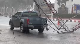 Monsoon rainstorm knocks down 100ft radio tower in Thailand