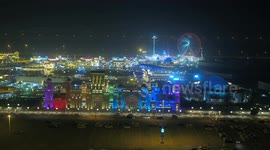 Multi lens filming of Dubai Global Village night scene.
