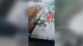 Alert policeman comes to the aid of man who slipped while boarding moving train in southern India