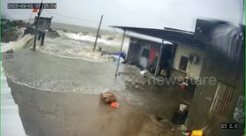 Typhoon Saola causes tidal surges, flooding seaside homes in southern China