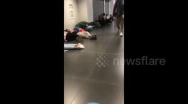 Passengers sleep on pool inflatables and luggage in Italian airport due to air traffic control issue