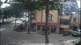 Speeding car falls 6 feet and crushes motorbike in India
