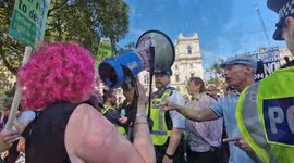 Protest gets heated as anti-abortion and pro-choice demonstrators confront each other on Parliament Square