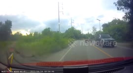 Wooden trailer detaches and smashes into oncoming car