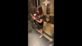 Couple attacked in LA apartment elevator by 'drunk' woman with young daughter watching on
