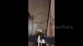 Raging floodwater sends van crashing into road sign as Storm Dana lashes Madrid