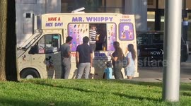 Tourists cool down with ice-creams along the Southbank as heatwave hits the Capital