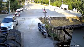 Chinese woman escapes serious injuries after out-of-control scooter plunges to roadside