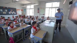 Firefighters Give A Fire Safety Lesson To Students at A School in Taizhou, China