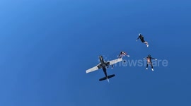 Group of 12 female skydivers set new British record for largest upside down formation jump
