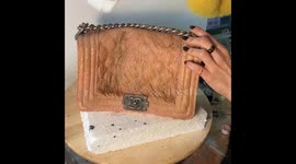 Disgusting or high-tier fashion? Artist designs bizarre flesh-themed handbag