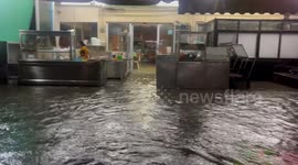 Flash floods swamp restaurant amid heavy rain in central Thailand