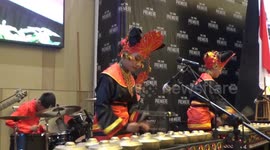 A combination of traditional West Sumatran Minangkabau (Talempong) musical instruments with modern guitar and keyboard musical instruments