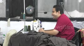 Palestinian tailors make clothes at a sewing factory in Gaza city.
