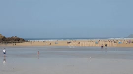 Perranporth sand storm, the hot off shore breeze is blowing the sand dunes o