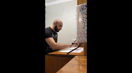 Artist Draws Three Portraits at the Same Time with One Hand