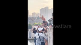 'Diving grandpa' becomes China's unexpected riverside attraction