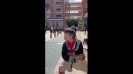 Watch how teenager spins top with fingertips