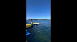 Daring woman's first-ever backflip turns into a back-first splash into water
