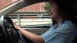 Young woman overcomes sexist passengers to become taxi driver in male-dominated industry