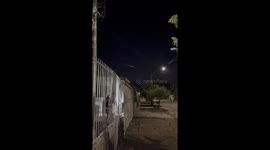 Meteor Streaks Across Night Sky