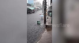Monsoon storm washes away crates at market in northeast Thailand