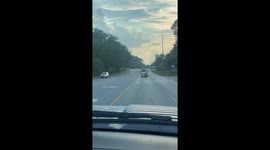 Precariously Placed Boat Falls Off Tire-less Trailer