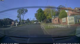 Inattentive Driver Collides With Parked Car