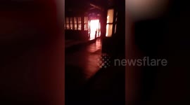 Firemen battle fire engulfing floating market in Pattaya, Thailand