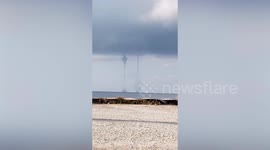 Spectacular quadruple waterspout tornadoes swirl off Philippines coast