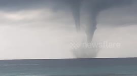 Cluster of waterspout tornadoes forms during storm in the Philippines