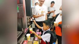 Excited locals visit  first-ever 7-Eleven store in Communist Laos