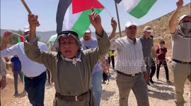 Palestinians argue with Israeli security forces during a protest against the establishment of Israeli outposts, in Beit Dajan, east of the West Bank city of Nablus.