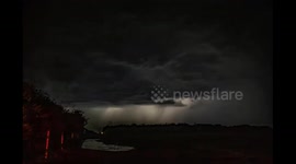Timelapse video from local storm chasers from a thunderstorm in Devon as lightning strikes frequently lighting up the sky
