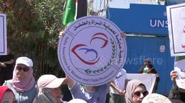 Palestinian women take part in a protest against the Israeli violations committed against the women in Hebron, in front of the headquarters of United Nations