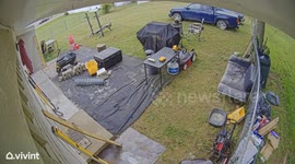 Runaway Tire Crashes Into Man's yard